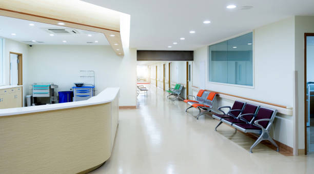 istock Empty nurses station and corridor in a hospital 1779744565