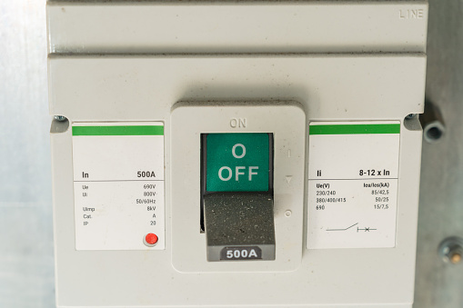 An electric control panel with toggle switch off. Electrical voltage.