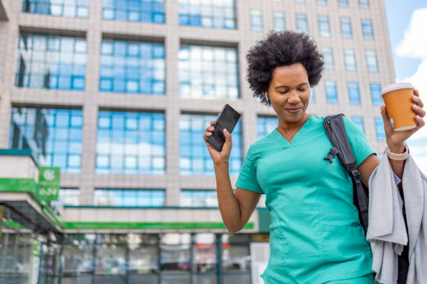 istock Happy nurse dancing outdoors. 1779771238