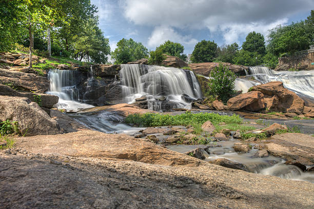 Long exposure captures the slow flowing Reedy River at Falls Park