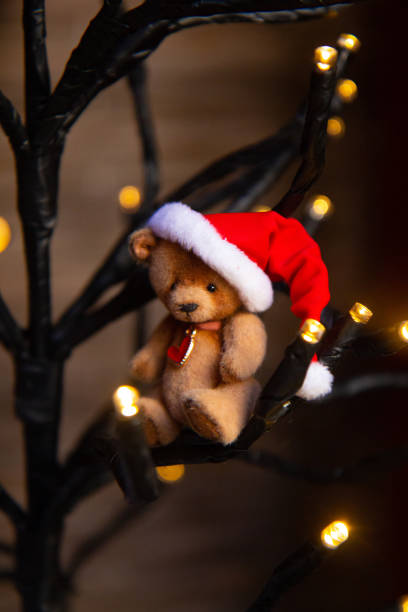 istock Cute hand made toy bear with Christmas Santa hat 1779781502