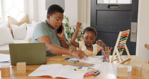 istock Remote work, multitasking and mother with girl child, phone call or home school lesson help. Freelance, productivity and busy mom with kid in house for math, education or startup business balance 1779783670