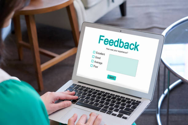 istock A lady is busy typing on her laptop computer which shows a feedback form on its screen. 1779790645