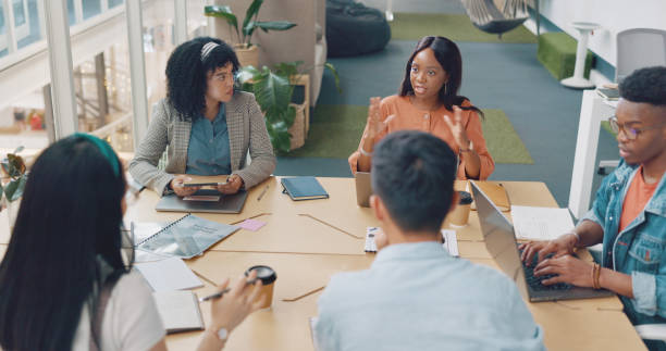 istock Business people, manager and creative with planning, meeting and progress report with a project, feedback or ideas. Staff, strategy or group with conversation, brainstorming or cooperation teamwork 1779805354