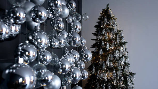 istock Silver Christmas decorations. Beautiful silver background with shiny silver balls. Festive mood. Christmas or holiday theme 1779814362