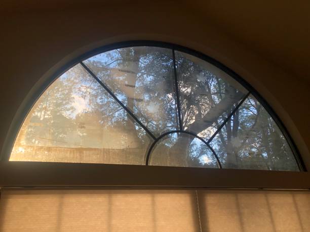 istock Semi-circular window with haze from failed double glazing 1779816316