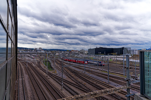 Aerial view of railway track field at train station Hard Bridge at industrial district of Swiss City of Zürich on a cloudy autumn day. Photo taken October 21st, 2023, Zurich, Switzerland.