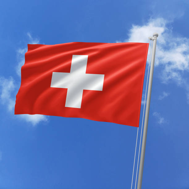 istock Switzerland flag fluttering in the wind on sky. 1779834199