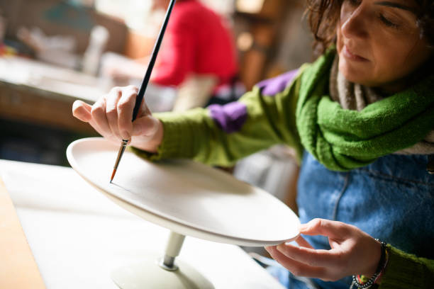 istock Ceramics pottery craft workshop: Dish decoration painting 1779835820