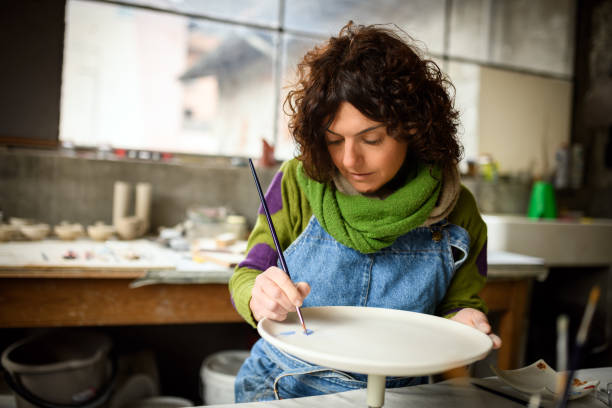 istock Ceramics pottery craft workshop: Dish decoration painting 1779836933