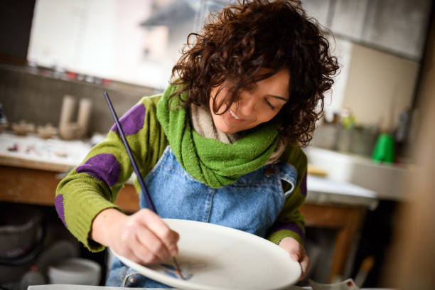 istock Ceramics pottery craft workshop: Dish decoration painting 1779837481