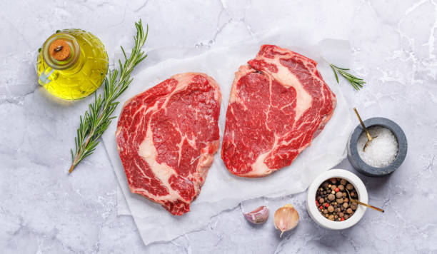 istock Raw ribeye steaks with savory spices 1779839946
