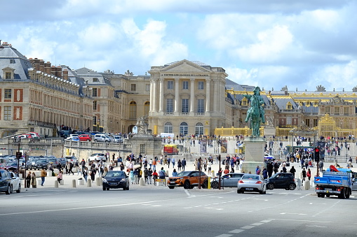 Paris, France - May 11, 2019:  Hotel Ritz on Place Vendome, Paris. Few people at the entrance around parked cars.