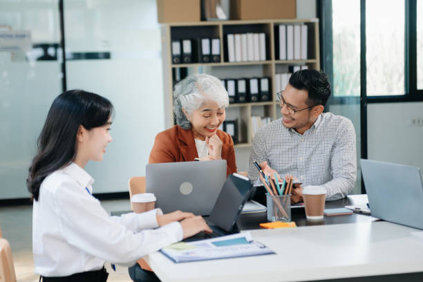istock Young business creative team are brainstorming planning discussing while sitting in office 1779851162