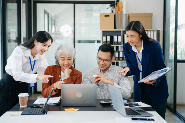 istock Young business creative team are brainstorming planning discussing while sitting in office 1779851182