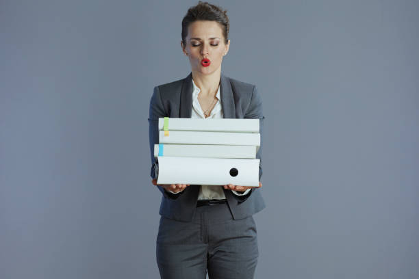 istock stressed modern woman employee against grey background 1779853452