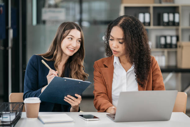 istock Two Young businesswoman discuss with new startup project Idea presentation. 1779862494