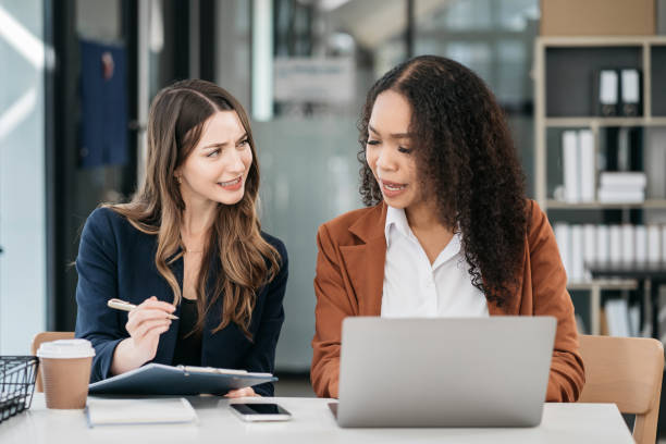 istock Two Young businesswoman discuss with new startup project Idea presentation. 1779862519