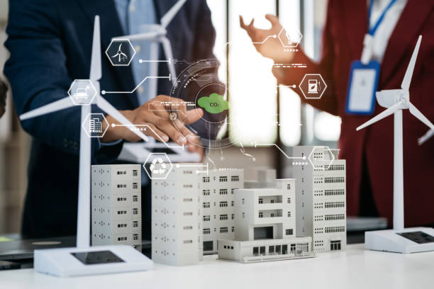 istock Business team brainstorming using tablet, laptop computer for working technology and business,  Renewable energy-based green businesses and global warming. 1779863158