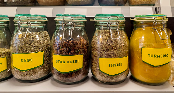 variety of spices in jar for sale at glasgow scotland england UK
