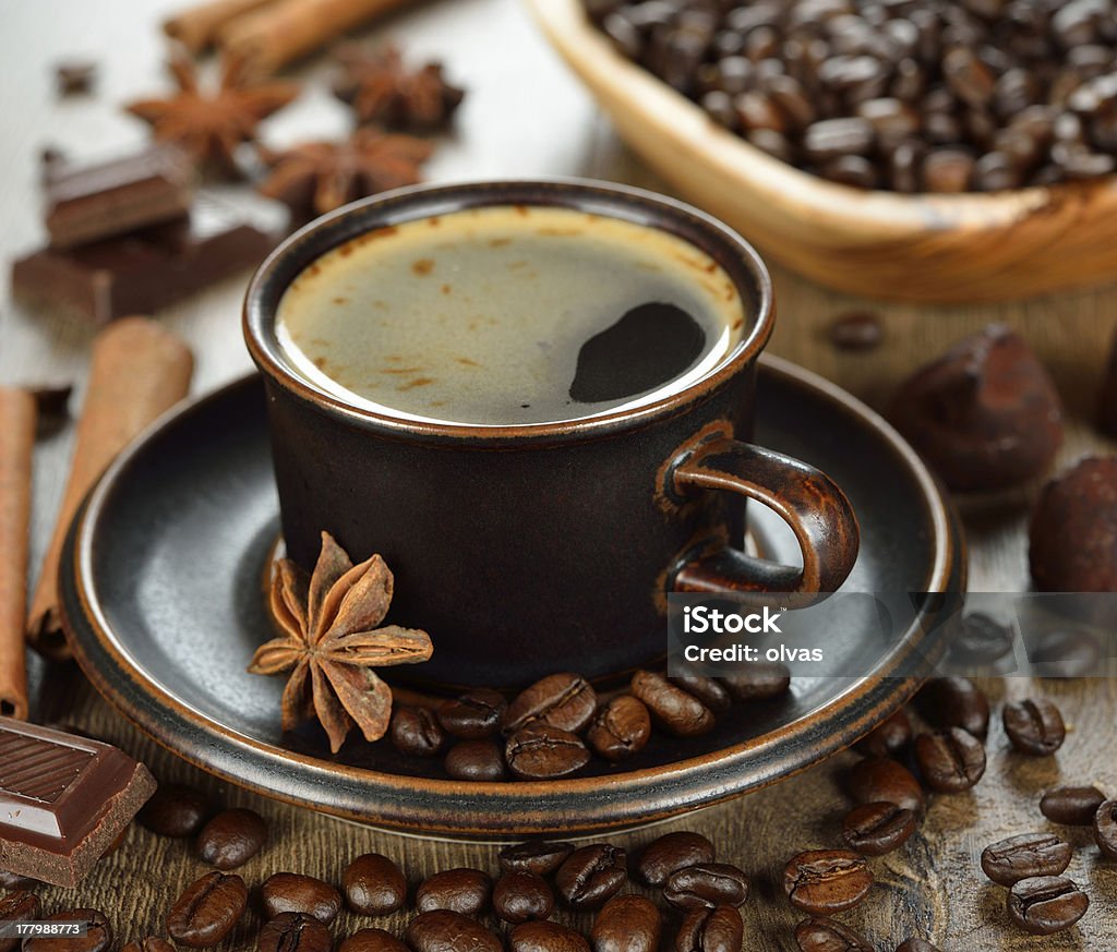 Coffee, chocolate and spices Coffee, chocolate and spices on a brown background Anise Stock Photo