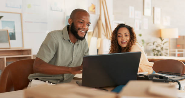 istock Business people, laptop and planning with connection, cooperation and creative with collaboration. Staff, black man and woman with a pc, conversation and email notification with teamwork and ideas 1779891385