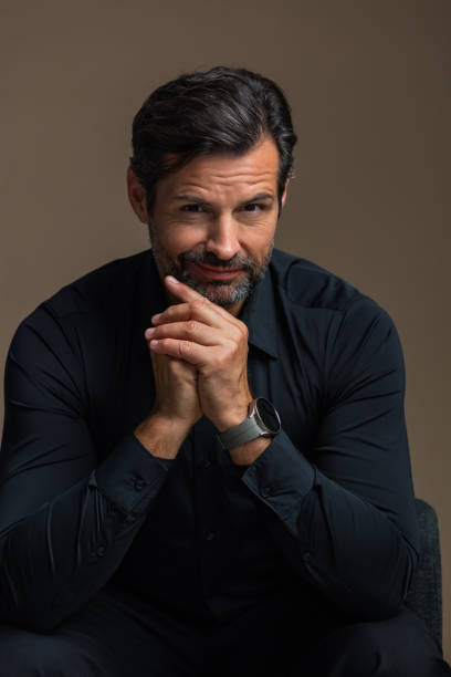 istock Portrait of handsome man smiling at camera 1779902496