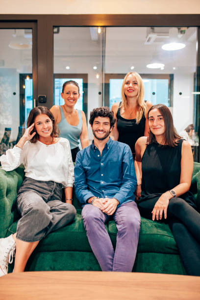 istock Successful young business team gathering in modern workspace 1779910418