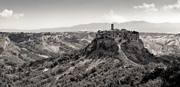 Panoramic view of the famouse medieval citadel of Civita town with the elevated walkway (Italy - Lazio - Viterbo - Bagnoregio).