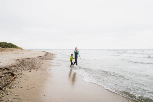 istock Gloomy day on the beach with my mom 1779912102