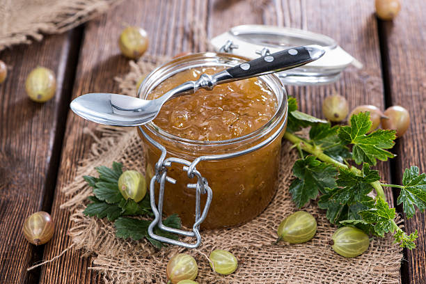 Portion of Gooseberry Jam Portion of fresh homemade Gooseberry Jam gooseberry stock pictures, royalty-free photos & images