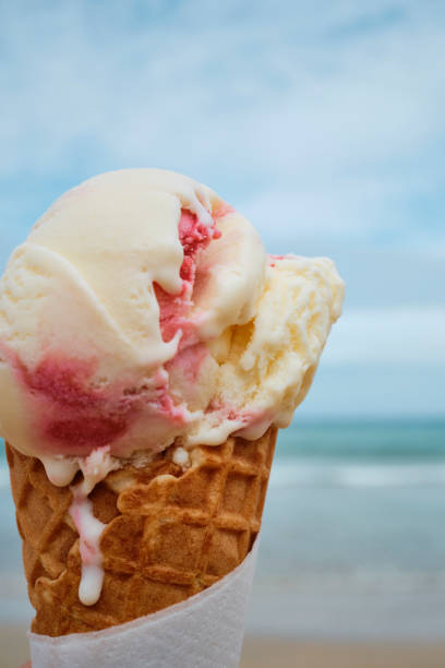 istock Close up of a melting Raspberry Ripple Ice cream cone at a beach in Newquay, Cornwall. 1779927265