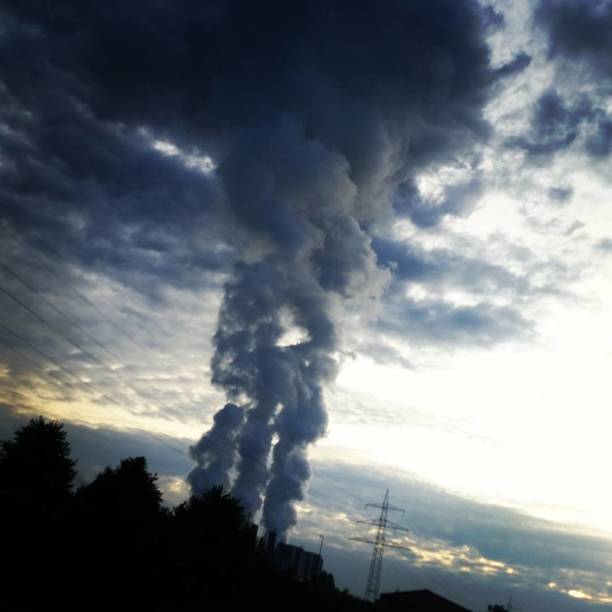 istock Smoke Emitting from a factory 1779930406