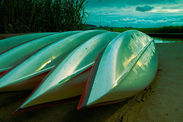 Kayaks on the beach stock photo