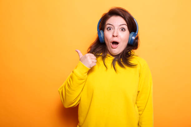 istock Vibrant woman on isolated backdrop 1779944869