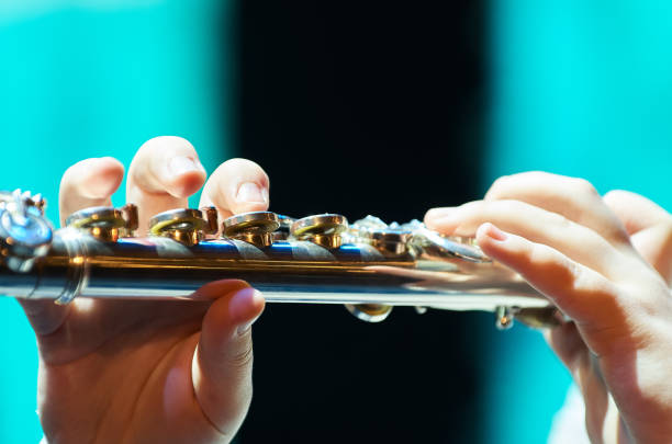 istock Young girl playing a homemade flute 1779957830