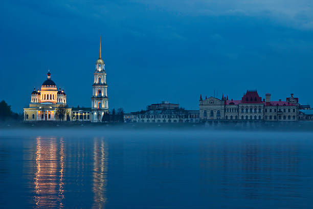 Beautiful riverside of Volga in the evening. View of historical center of Rybinsk, Russia