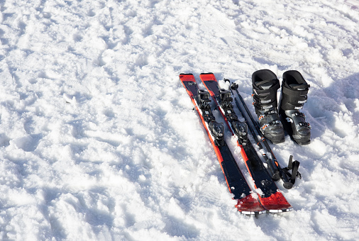 Young adult man snowboarding in mountains