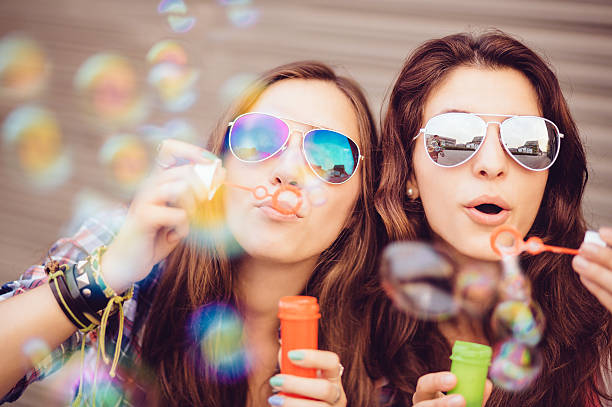 istock Hip Teenager blowing soap bubbles 177998787