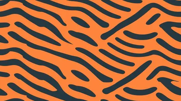 Vector illustration of Stripe animals jungle tiger pattern. Seamless Border with Tiger Print. Seamless tiger skin pattern. Orange zebra skin vector print. Seamless tiger stripe print for clothing or print.