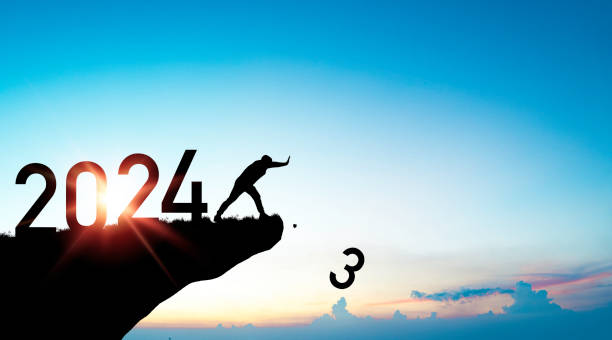 istock Silhouette man pushing number 3 from cliff with 2024 on blue sky for preparation merry Christmas and happy new year from 2023 to 2024 concept. 1780049871