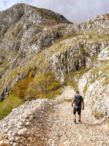 istock Hiking in the mountains on steep mountain road 1780060742