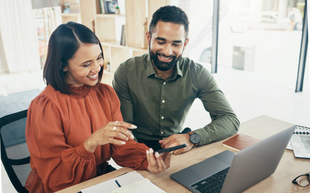 istock Teamwork, phone and business people in an office for coworking, training or help with a project. Happy, internet and a woman, man or employees with technology for the web, app or collaboration 1780093738