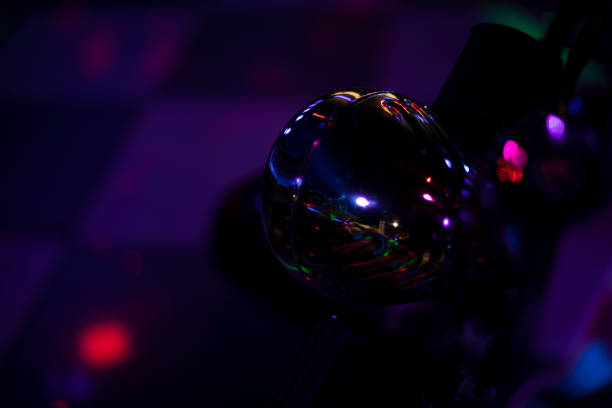 Chrome motorcycle part. Motorcycle at the disco. Chrome handle. Bright object.