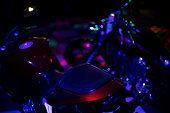 Motorcycle in dark. Transport in blue light. Bike at disco.