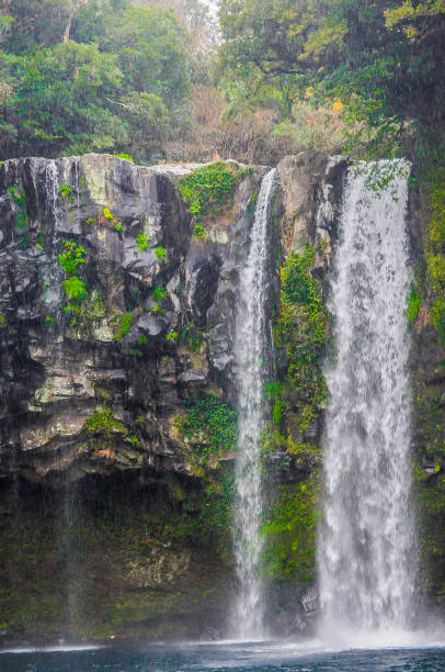 istock Jeju Tourist Destination: Cheonjiyeon Waterfall 1780117381