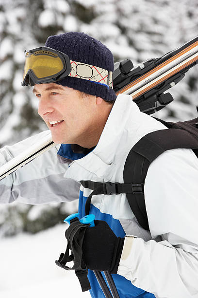 istock Middle Aged Man On Ski Holiday In Mountains 178013093