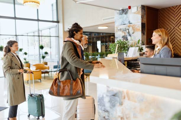 istock Hispanic businessman checking in at the luxury hotel 1780138730