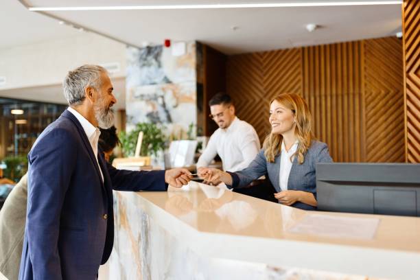 istock Two receptionist working in the luxury hotel 1780139300