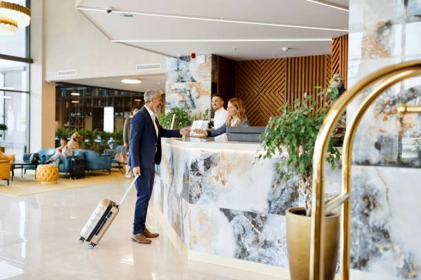 istock Elegantly dressed businessman checking out from the hotel 1780139315
